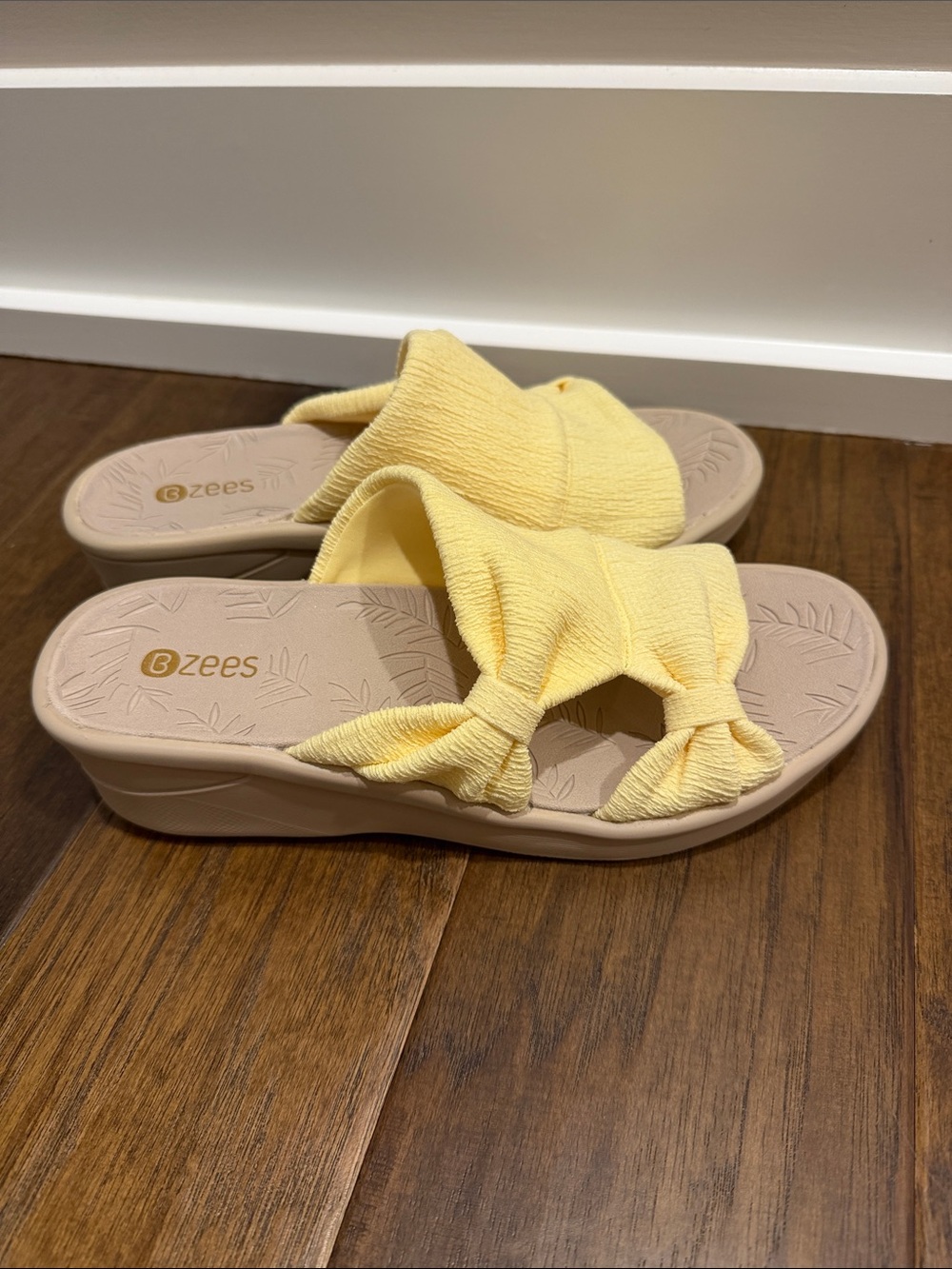 Bzees Pale Yellow Twist Slide Wedges